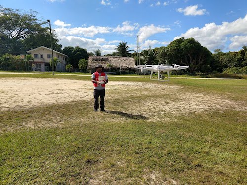 Launching and practicing manual control of the Belize Red Cross drone.